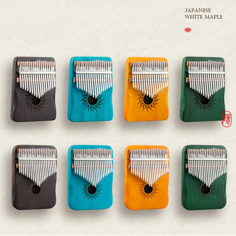 Eight hluru 17 21 keys kalimba finger piano mbira in black teal orange and green with sunburst designs for beginners