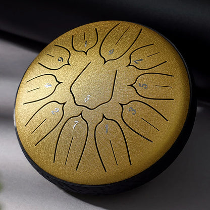 Golden hluru glucophone steel tongue drum with engraved notes and sleek finish for yoga meditation percussion use