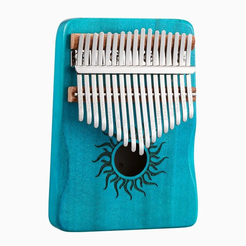 Turquoise wooden hluru kalimba finger piano with silver tines and black sun design thumb piano keyboard for beginner music lover