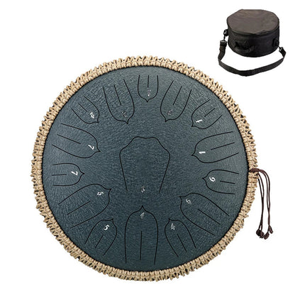 Dark gray steel tongue drum with woven natural fiber rim and numbered sections for ethereal percussion music