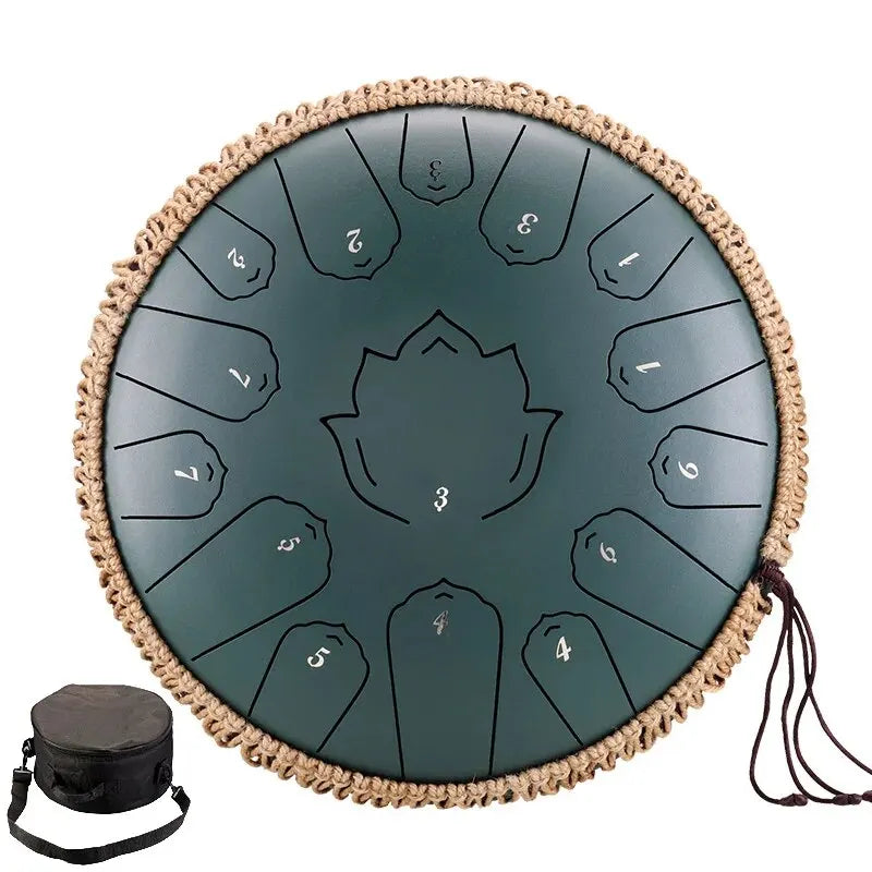 Teal hluru steel tongue drum glucophone with woven rim and numbered sections beside black carrying case for ethereal drum percussion
