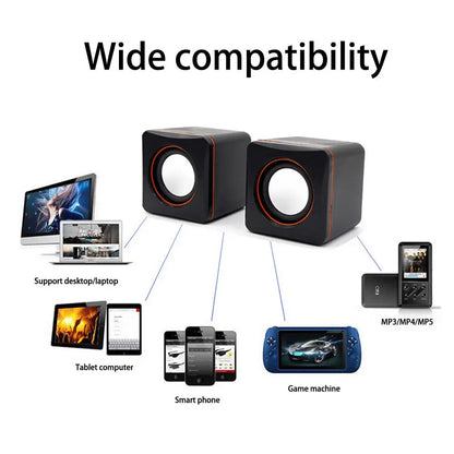 Black cube shaped speaker mini usb powered dual stereo speaker system with orange trim for desktop and notebooks