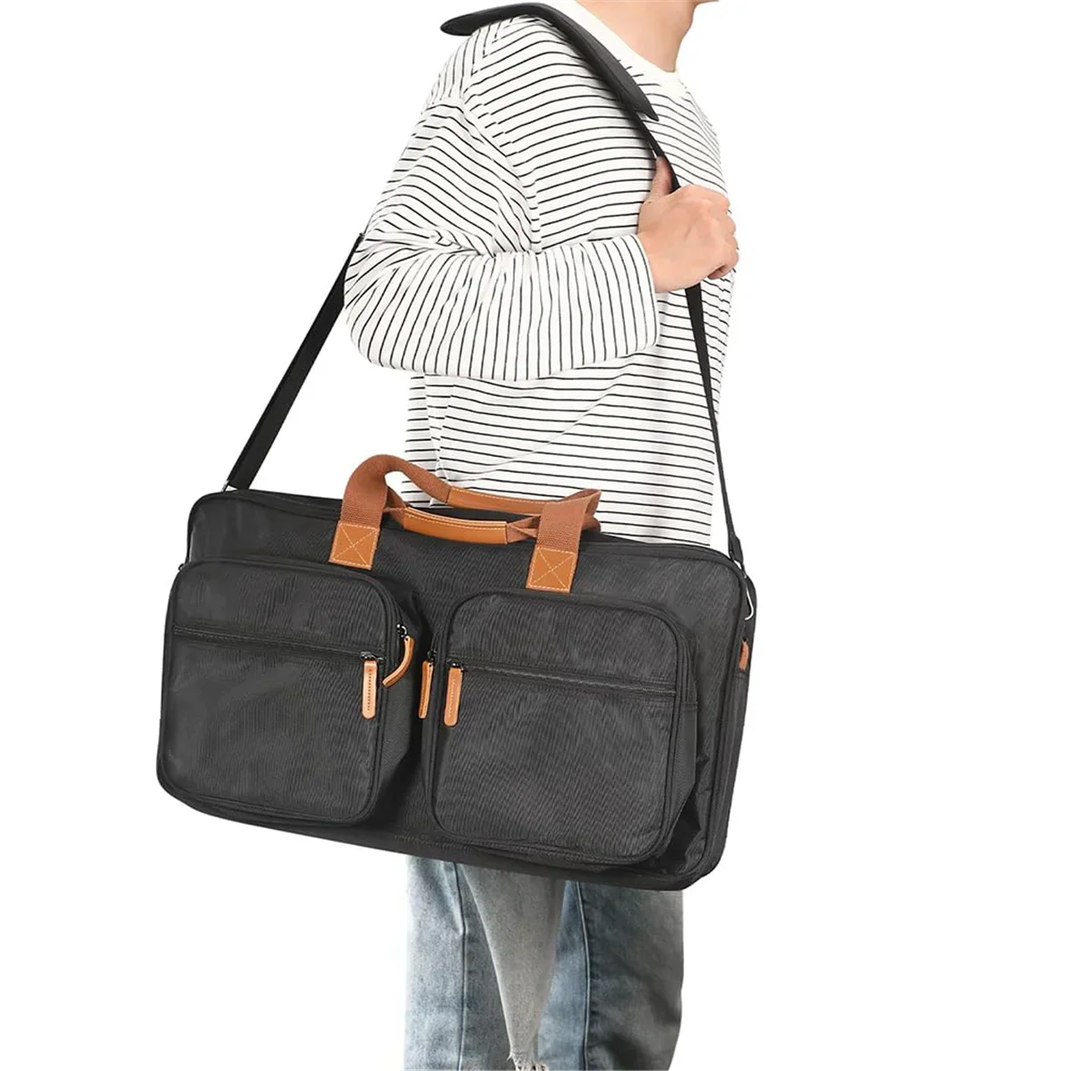 Black canvas duffel bag with tan leather handles and zipper pulls for pioneer dj ddj-flx4 ddj-rev1 and numark mixtrack platinum storage