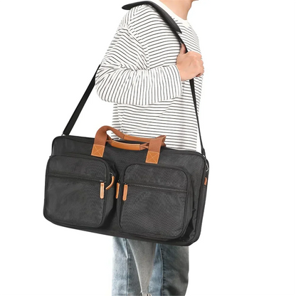 Black canvas duffel bag with tan leather handles and zipper pulls for pioneer dj ddj-flx4 ddj-rev1 and numark mixtrack platinum storage
