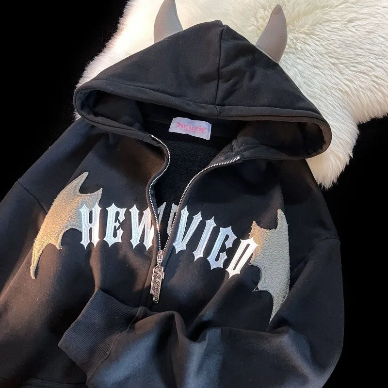 Black hoodie with silver and gold bat-wing embroidery front zipper and attached horns in vintage harajuku hoody style