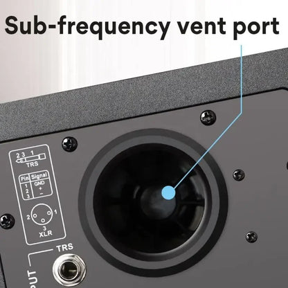 Black factory c5 professional active speaker studio showing back with sub-frequency port and xlr trs input jacks