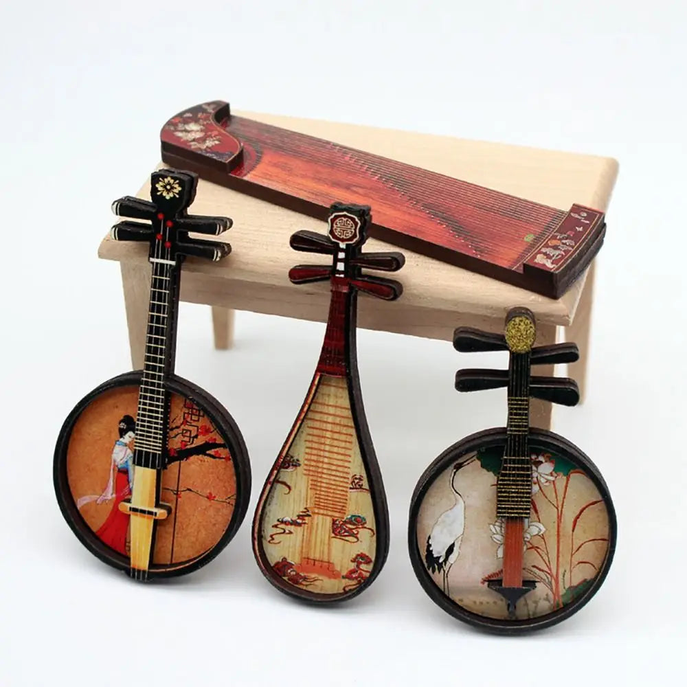 Three intricately designed miniature chinese classical instruments with courtesan pattern for dollhouse musical instruments display
