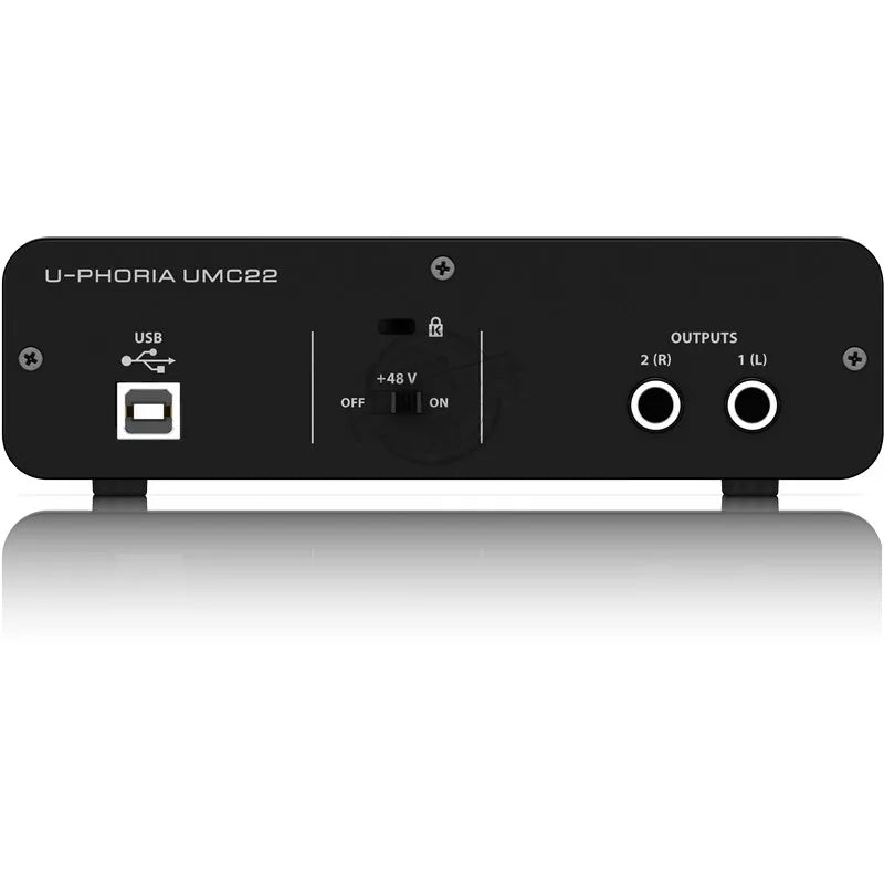 Black behringer umc22 usb audio interface with +48v phantom power switch and stereo output jacks for live recording
