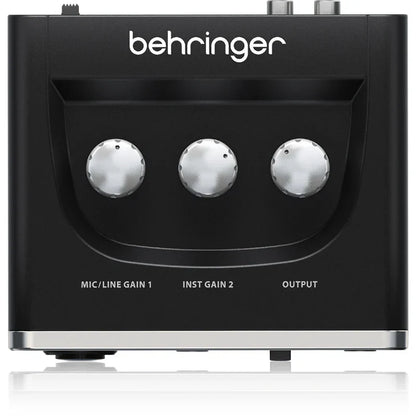 Black behringer umc202hd microphone amplifier usb audio interface with three silver gain knobs for live recording use