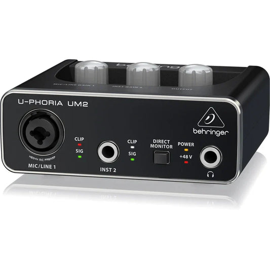 Black behringer umc202hd microphone amplifier usb audio interface with silver trim and multiple input output ports for live recording