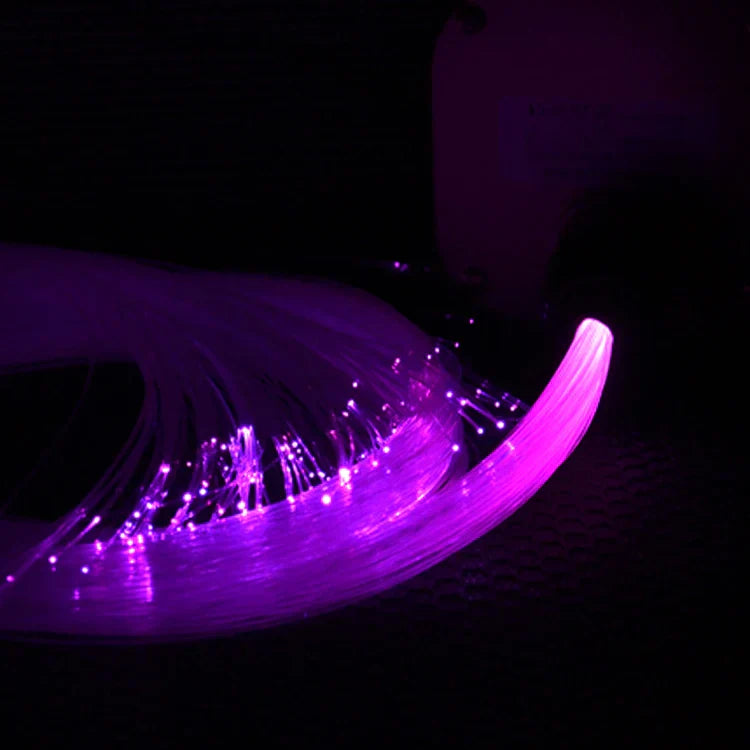 A glowing purple fiber optic light feather with twinkle led rgbw and golden music control for ceiling decoration
