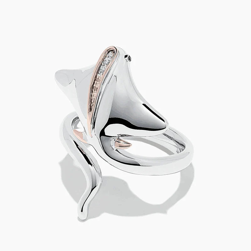 A sleek silver dolphin-shaped huitan hip hop women cute fish ring with rose gold diamond accent and opening adjustable design