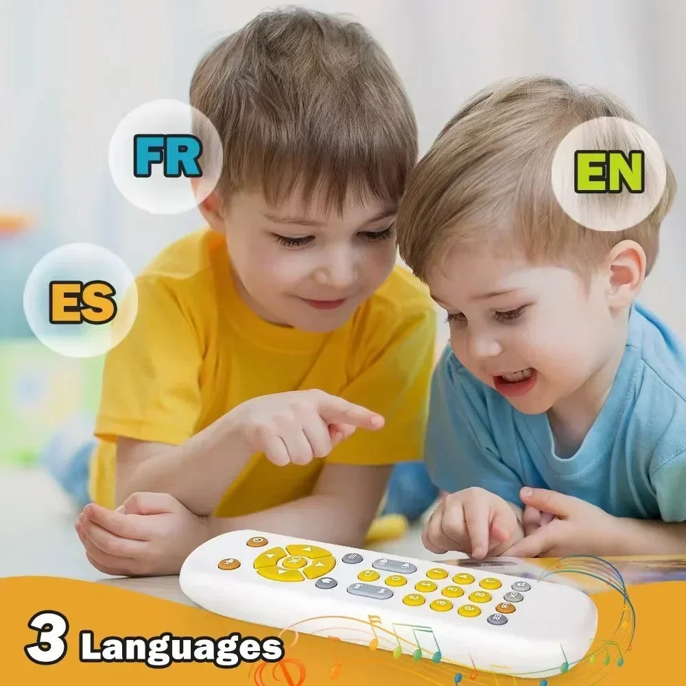 White plastic infant simulation music tv remote toy sensory remote with yellow gray buttons and multilingual settings