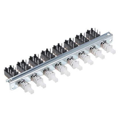 Silver metal interlock push button switch panel with ten black piano type dpdt rectangular switches with white knobs