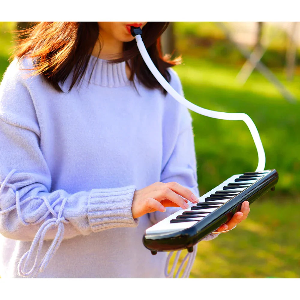 Black and white irIN 32 keys melodica with flexible white mouthpiece and carrying bag mouthpiece for musical instrument harmonica use