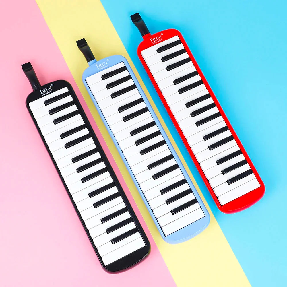 Three colorful irin keys melodicas in black light blue and red with piano-style keys and carrying bag mouthpiece set