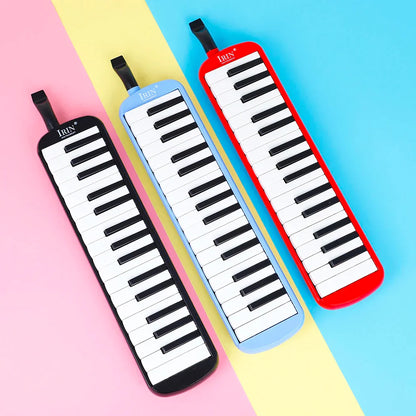 Three colorful irin keys melodicas in black light blue and red with piano-style keys and carrying bag mouthpiece set