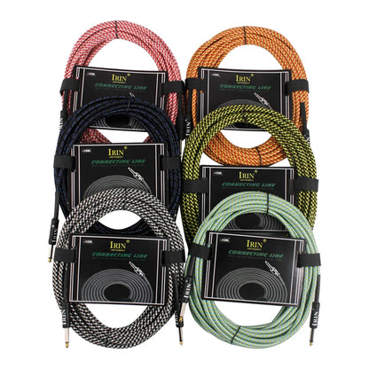 Coiled irin 3m guitar cable in assorted colors with woven texture and black label for electric guitar and electric bass