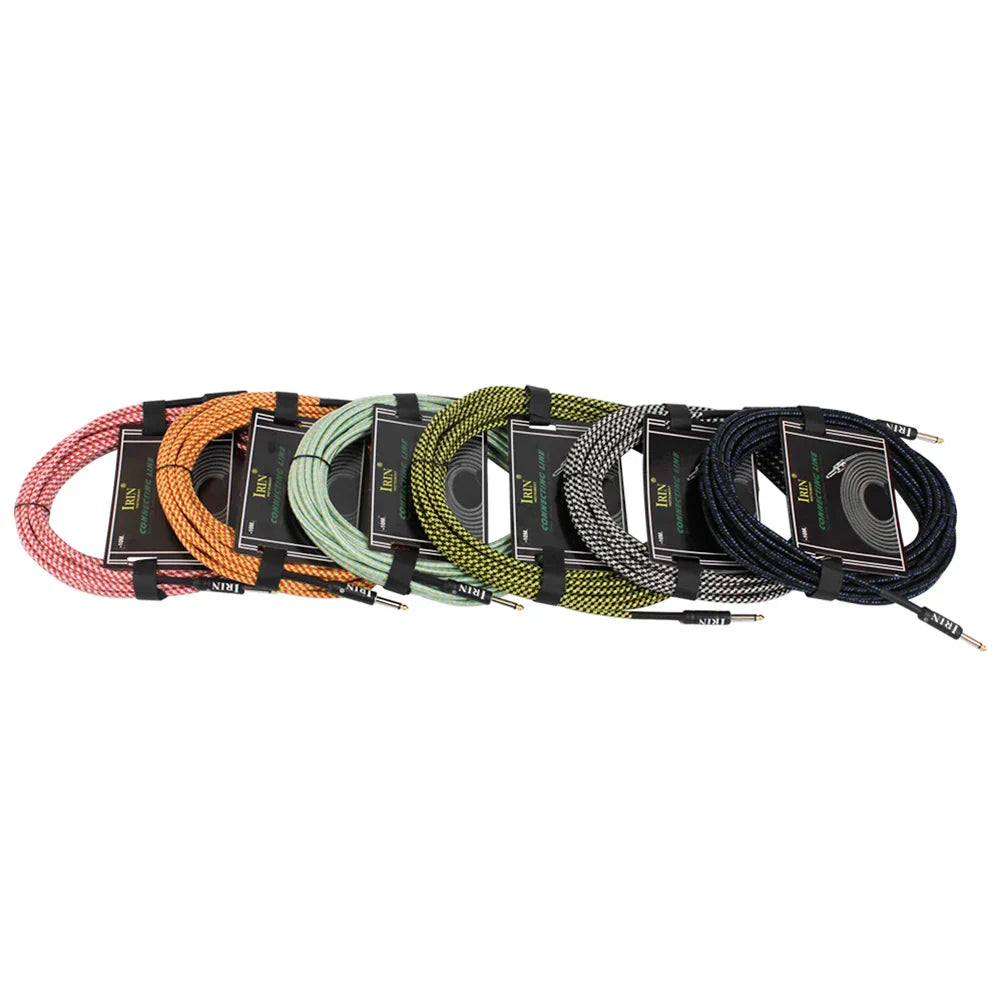 A collection of six braided irIN 3M guitar cables in assorted colors with metallic connectors for electric guitar and bass