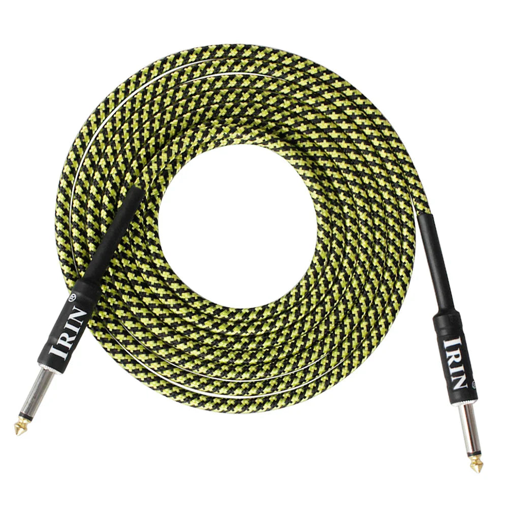 A coiled irin 3m guitar cable with black and lime green houndstooth braided jacket and silver-plated plugs for electric guitar and bass