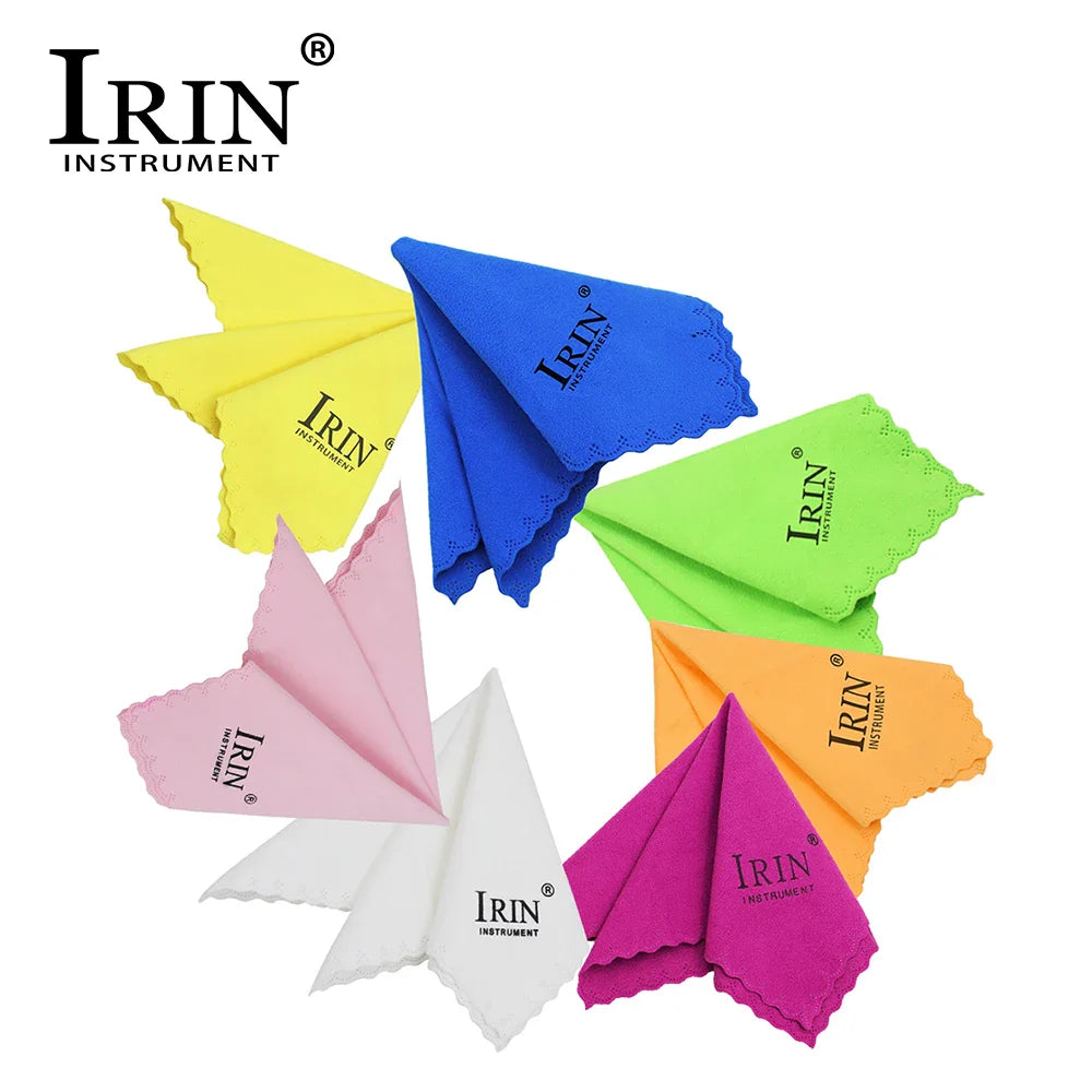 Brightly colored microfiber cleaning cloths in yellow blue green pink orange and magenta for guitar piano saxophone use