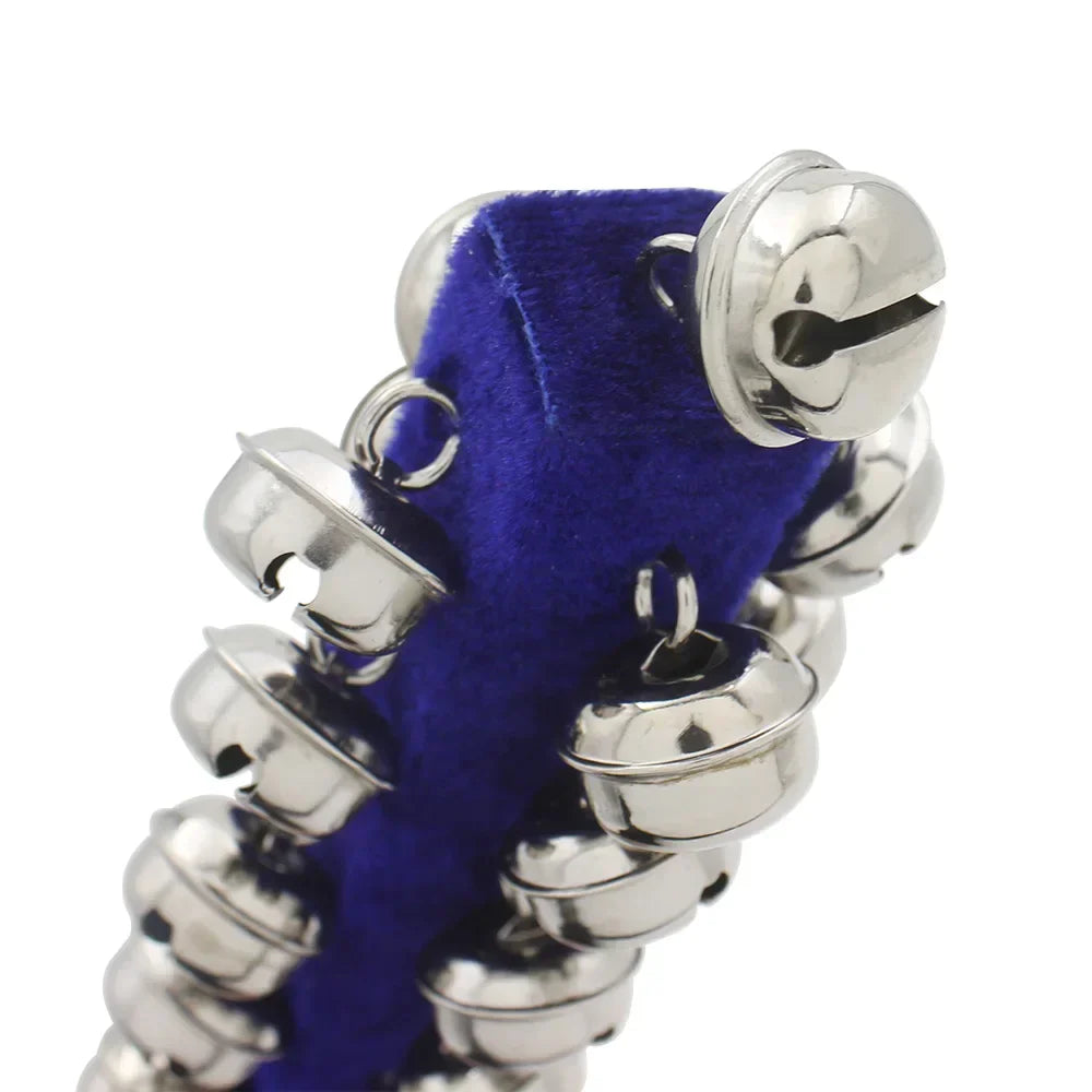 A string of shiny silver jingle bells attached to a deep blue velvet strap for children kids gifts stick shaker musical