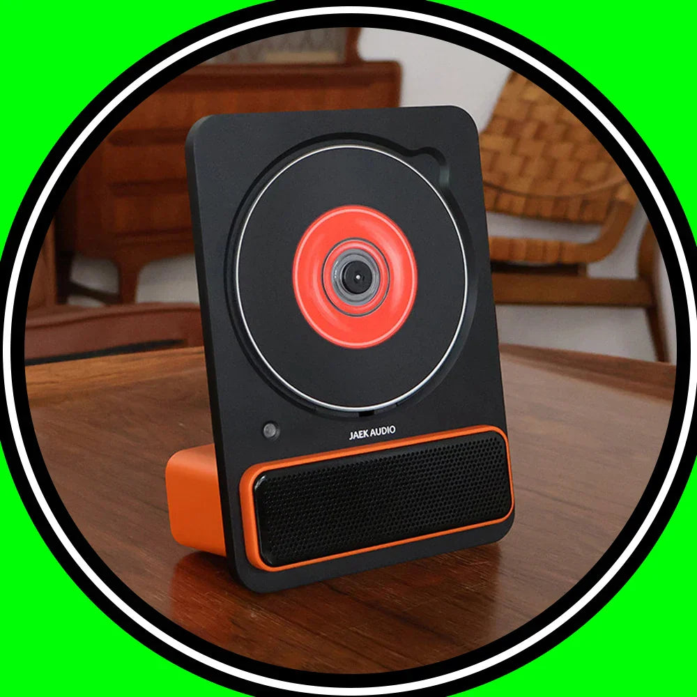 Black and orange jaek audio c30 machine phonograph record player with circular red accent and wireless bluetooth hifi features