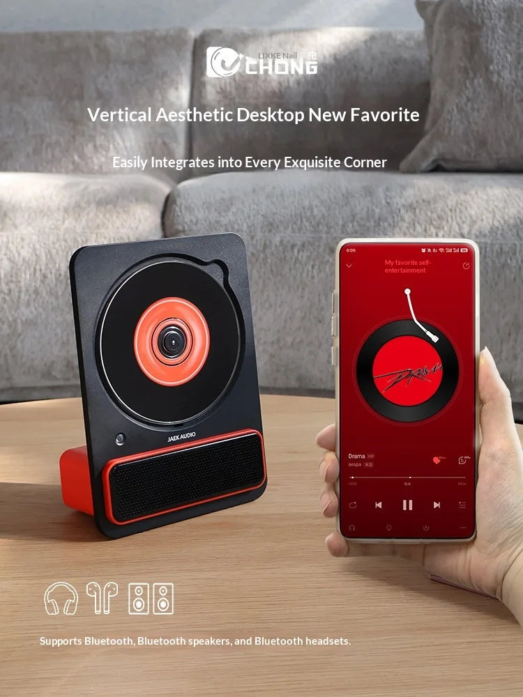 Black and red jaek audio c30 machine phonograph record speaker with orange vinyl record accent for album player hifi use