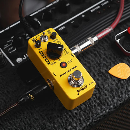Yellow joyo aitone series at06 drum machine guitar pedal with black knobs red led and 48 drum grooves for real-time fill