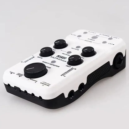 White and black joyo momix pro audio mixer with multiple knobs and input output jacks for guitar keyboard musical instruments