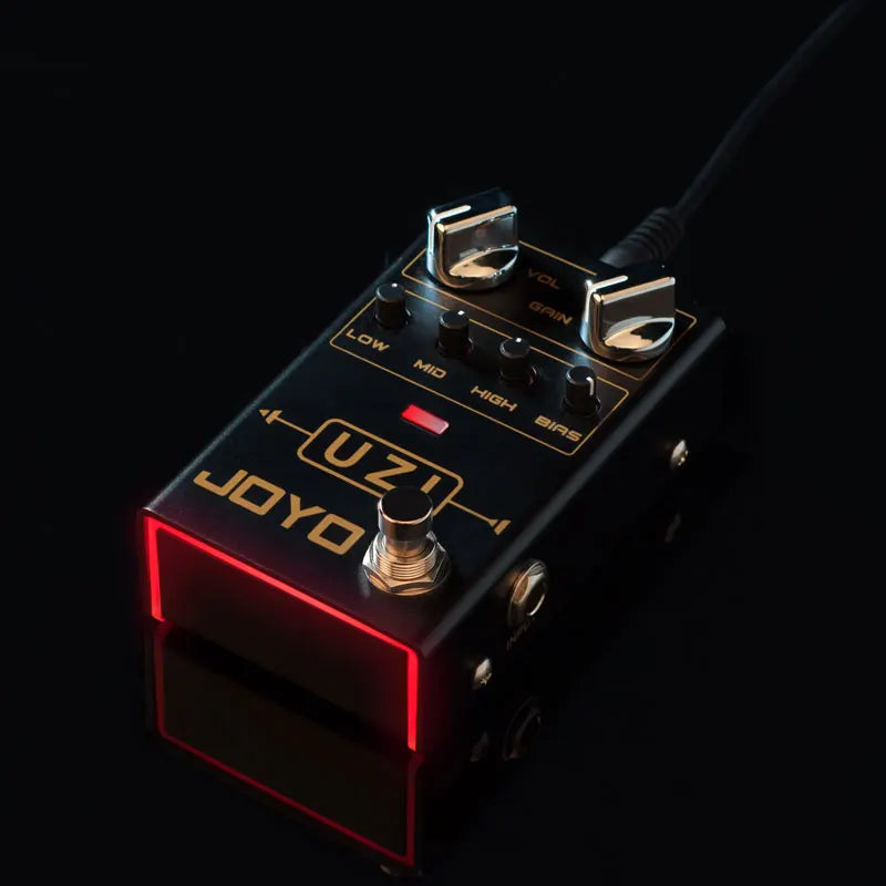 Black joyo uzi distortion electric guitar pedals processor footswitch with gold lettering and red led lighting for heavy metal music