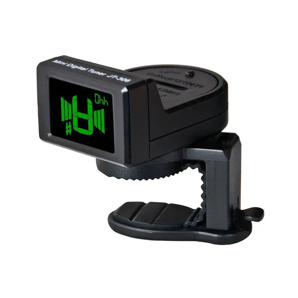 Black digital mini guitar tuner with green illuminated display for electric acoustic classic chromatic guitar bass tuning