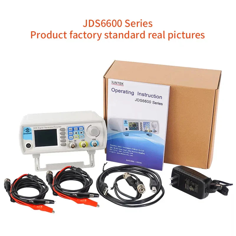 White juntek jds6600 series dds signal generator with blue gray panel black cables and orange clips featuring 60mhz dds function arbitrary waveform usb frequency meter pulse