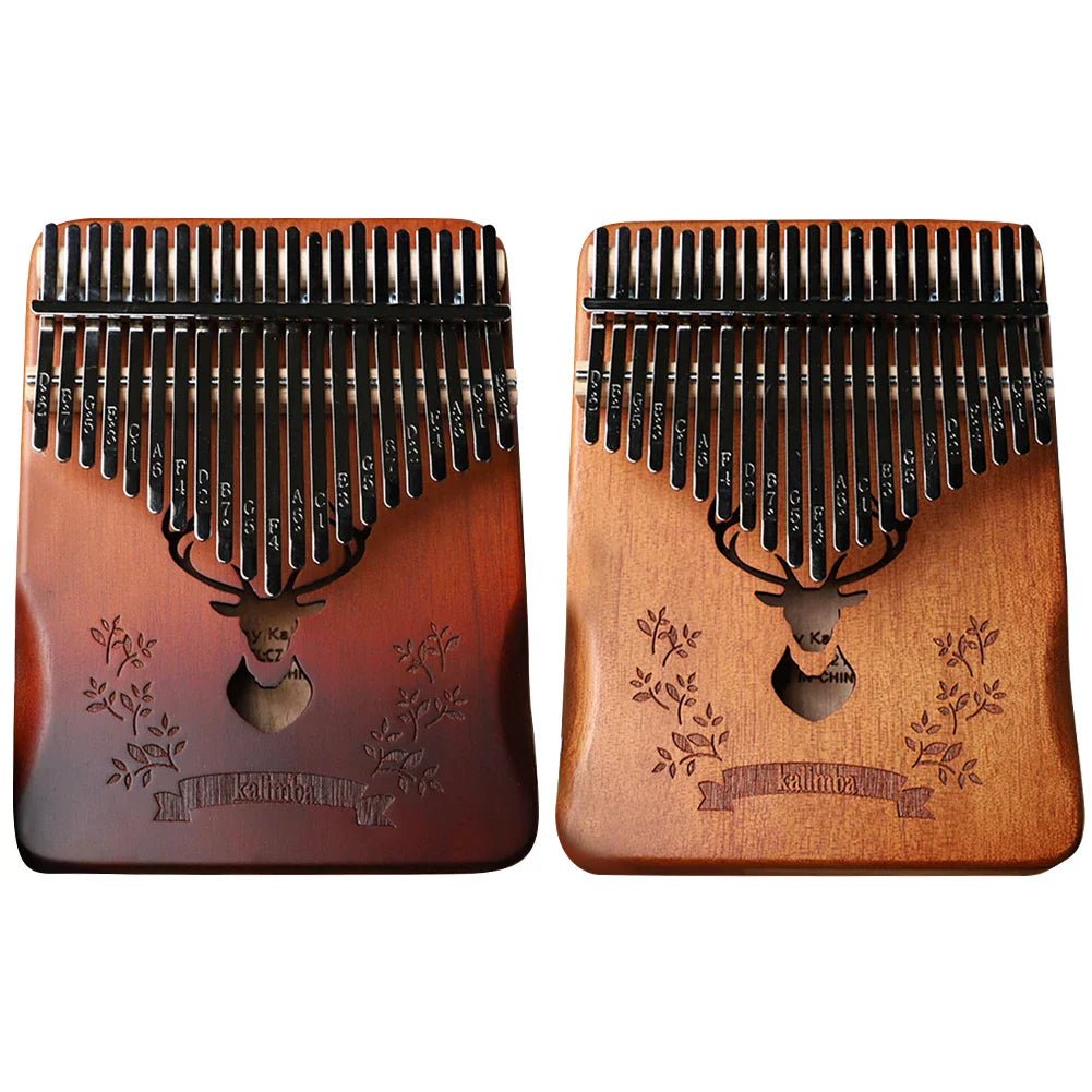 Two wooden kalimbas with black metal tines and engraved deer design professional thumb piano include instruction carrying bag