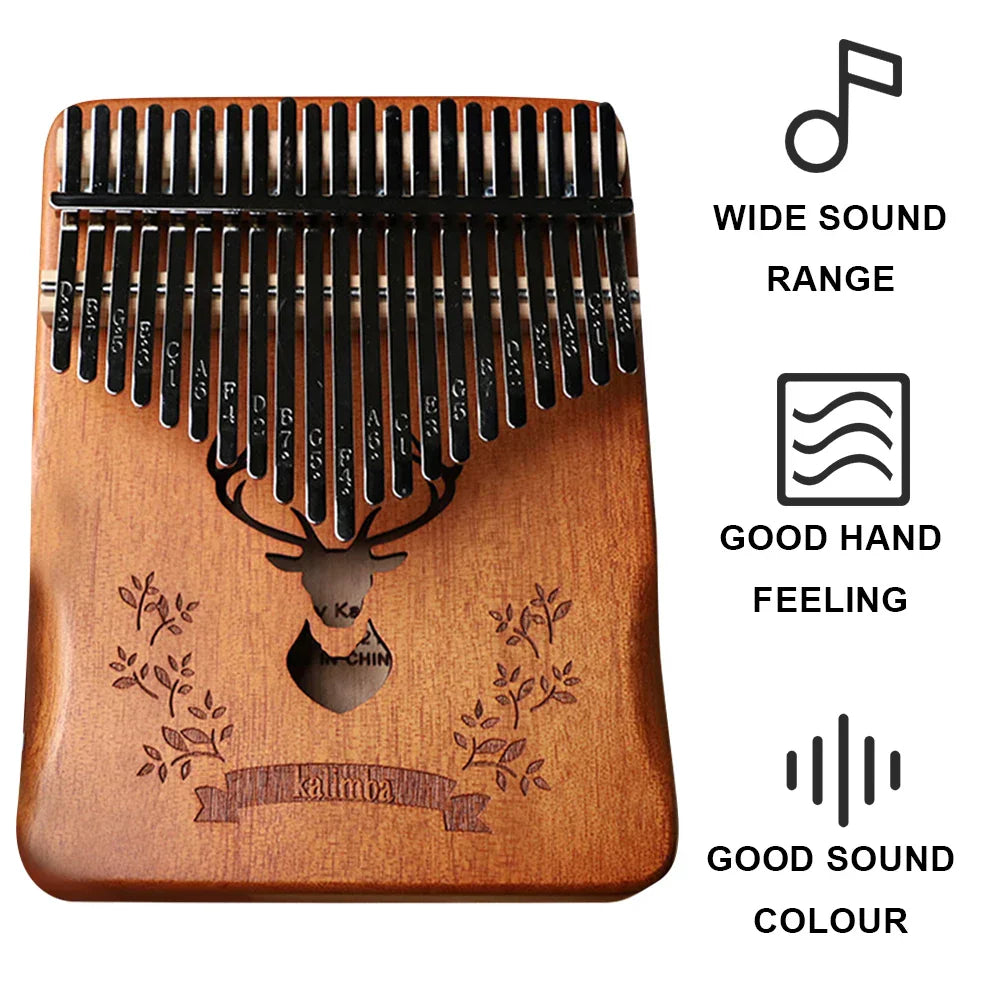 A wooden kalimba 21 keys professional thumb piano with black metal tines engraved deer head and instruction carrying bag