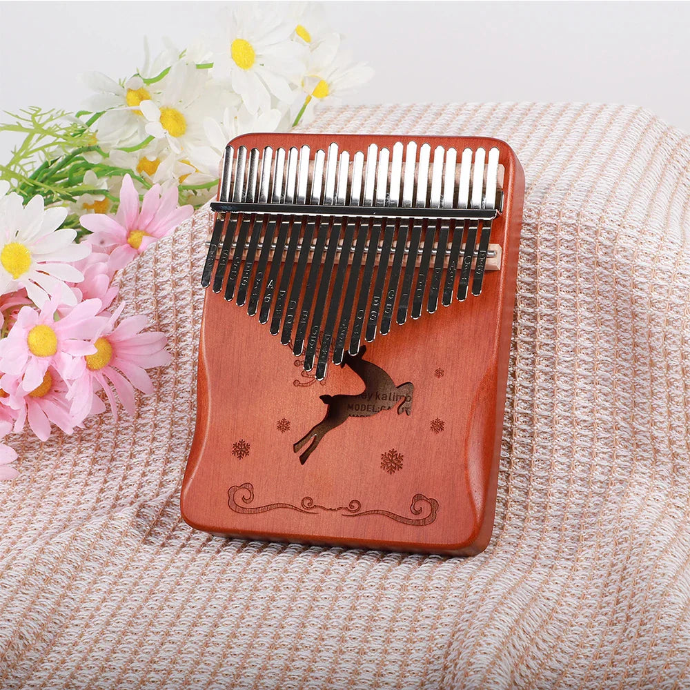 Red wooden kalimba finger piano with 21 silver tines and engraved deer design musical instrument mbira keyboard