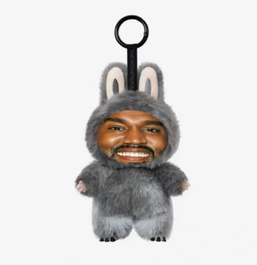 Gray fuzzy bunny-shaped keychain with white inner ears and smiling face from kanye west trendy pendant layeye design birthday present trending toy