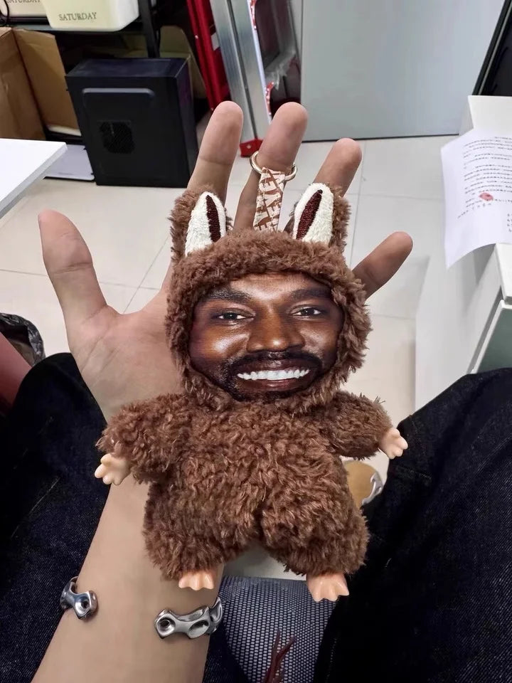Brown fuzzy bunny plush with printed kanye west face trendy pendant by layeye design birthday present trending toy