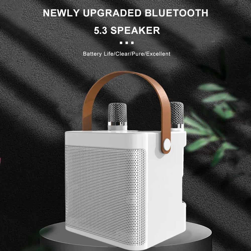 White karaoke machine with brown leather handle and two silver wireless microphones music kids portable 60w speaker