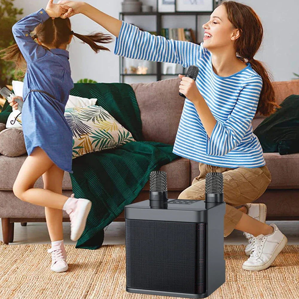 Black rectangular portable bluetooth karaoke microphone singing speaker with two wireless mic home party microphones mounted on top