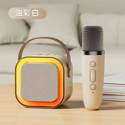 Cream-colored mini karaoke microphone singing speaker player with yellow orange gradient frame and leather handle for parties