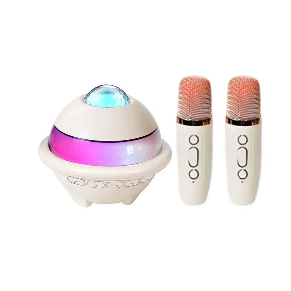 Cream-colored karaoke machine mini with projector night light and wireless dual microphones featuring rose gold accents
