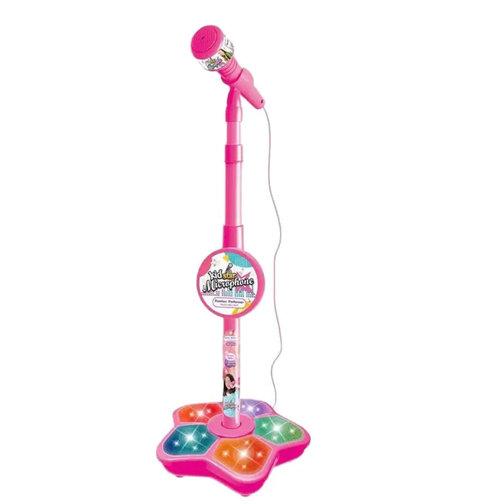 Pink kids singing microphone karaoke machine toy with illuminated star base for confidence building creative play