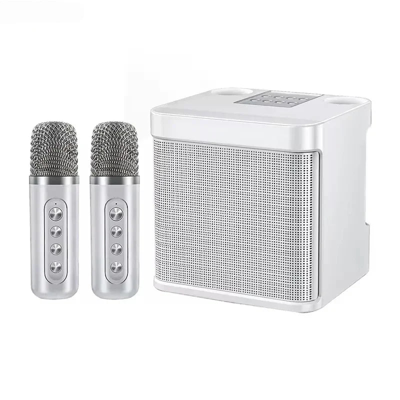 White karaoke machine with wireless dual microphones and portable boombox aux featuring silver mesh grille mics and compact speaker