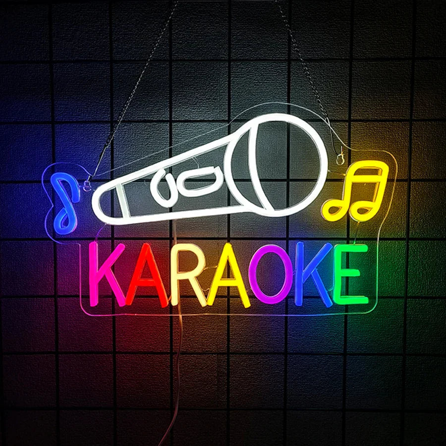 A vibrant rainbow-colored karaoke party neon sign with a white microphone and blue musical note for music studio decor