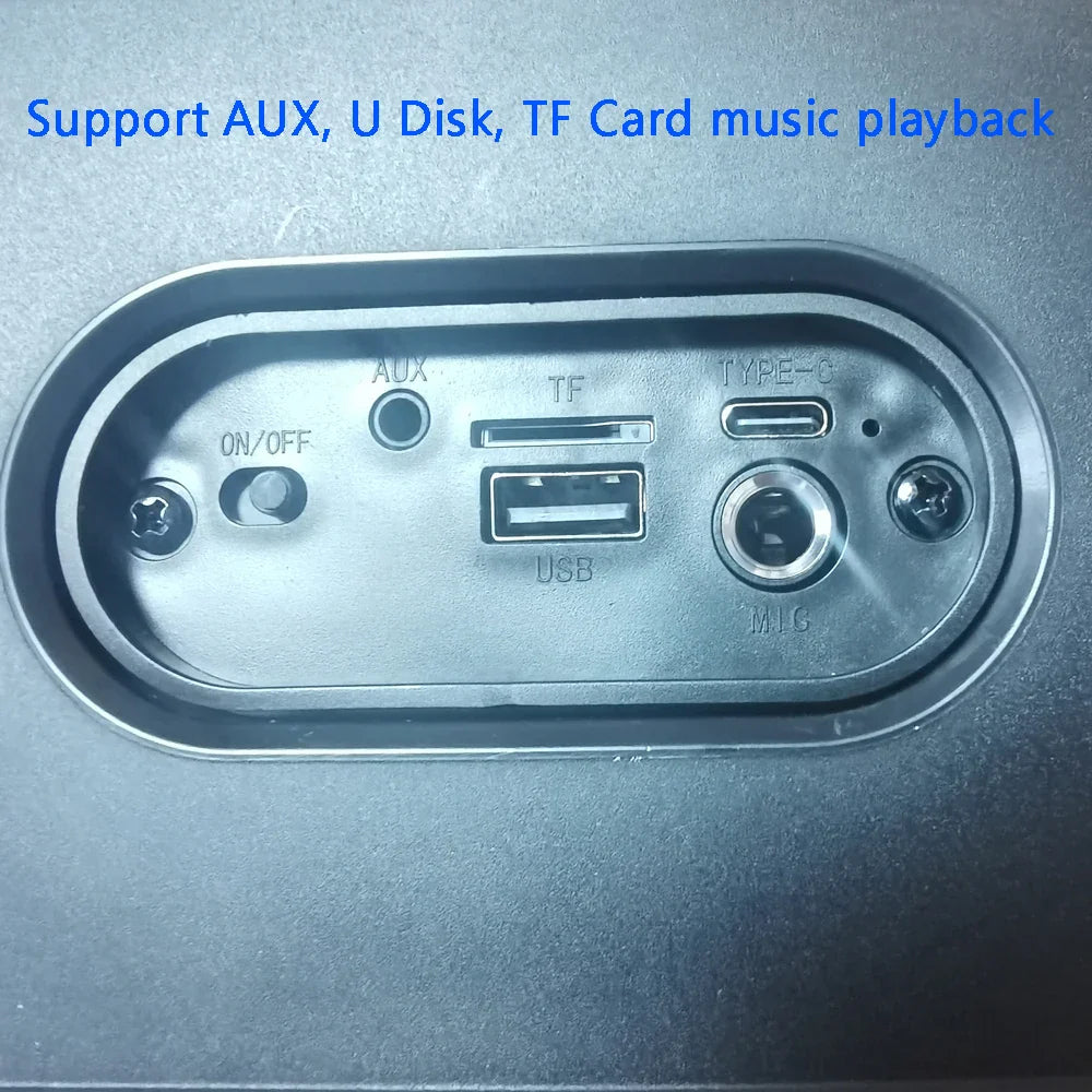 Black plastic karaoke radio with multiple connectivity ports including aux usb tf card slot and type-c interface back side view