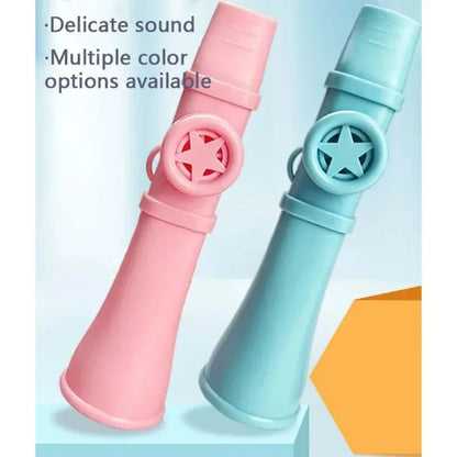 Pink and light blue plastic kazoo whistles with star-shaped cutouts designed for professional sound quality and musical use