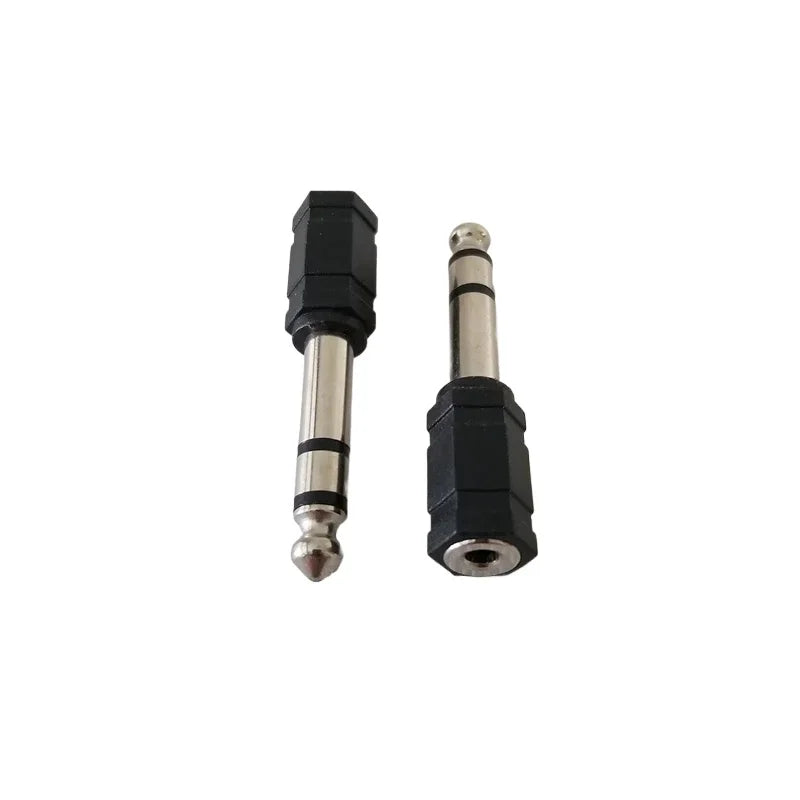 Black and silver electronic drum adapter converter with hexagonal plastic housing 3.5mm headphone connector jack