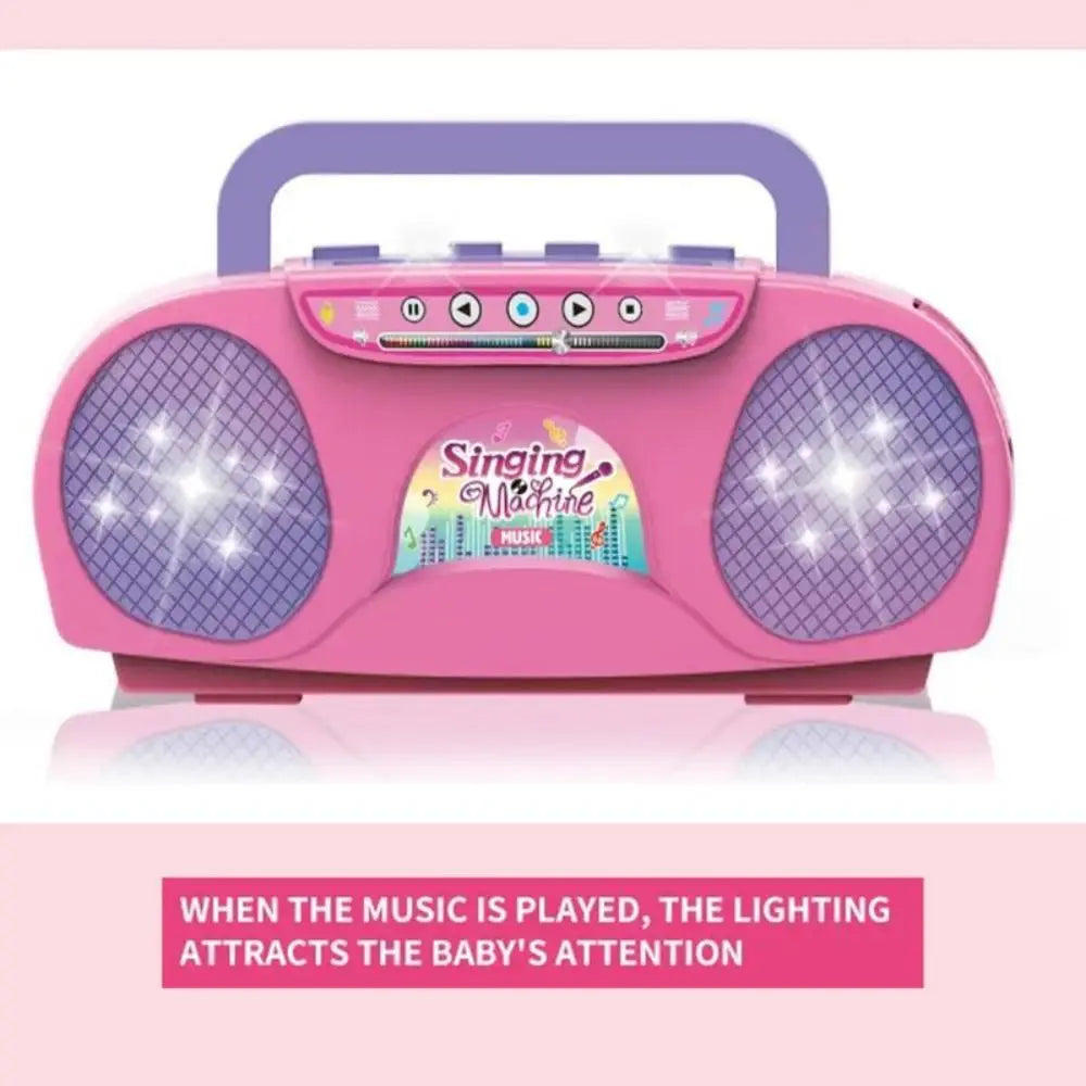 Pink plastic kid karaoke singing machine with purple mesh speakers and handle portable musical microphone party birthday gift