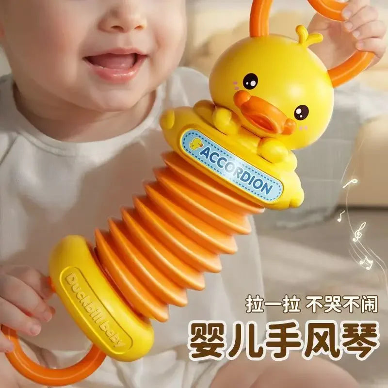 Yellow duck-shaped kids accordion toy with orange flexible bellows and handle for educational brain development and travel birthday gift